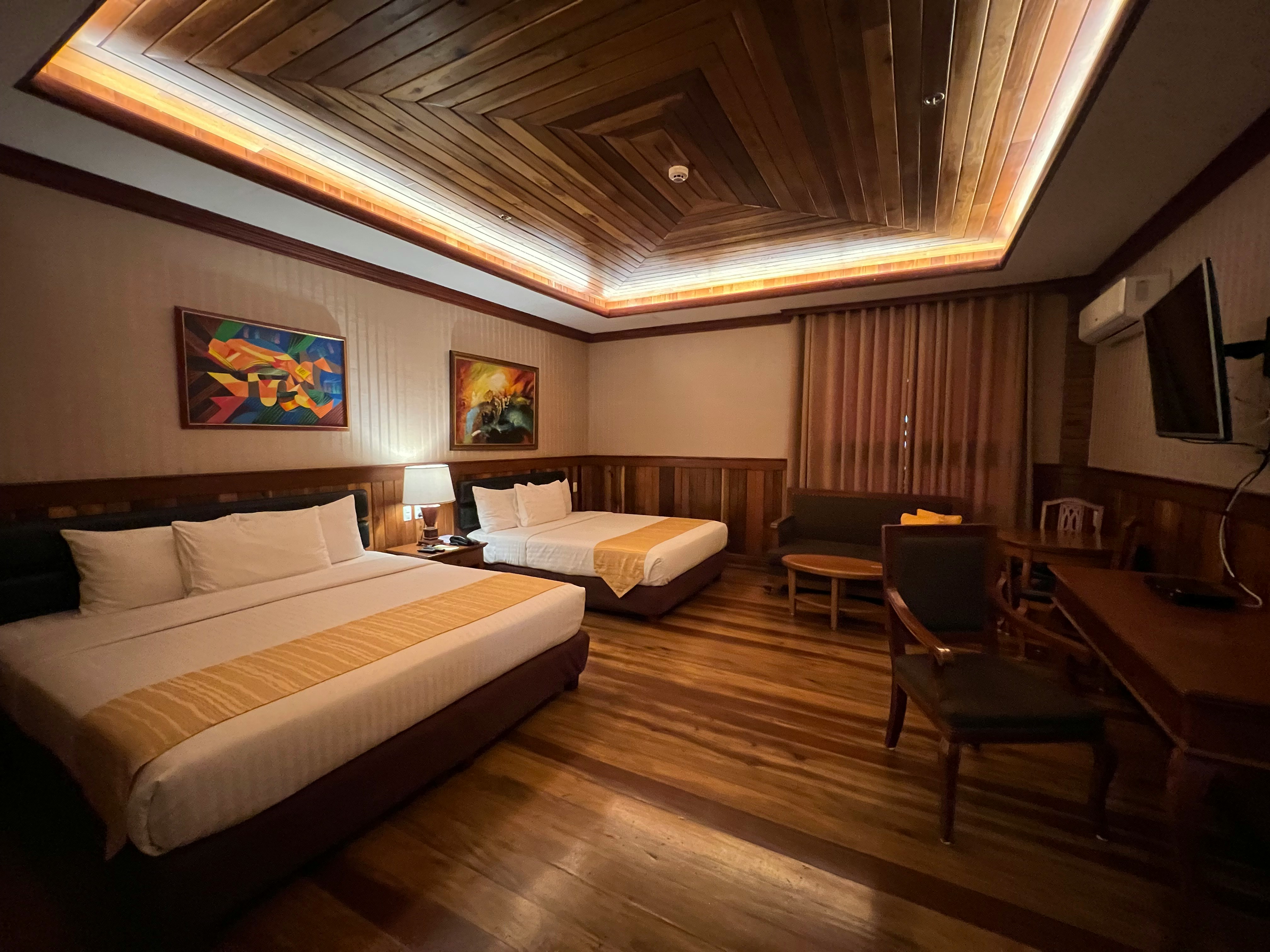 Family room with double bed and additional single bed, spacious layout