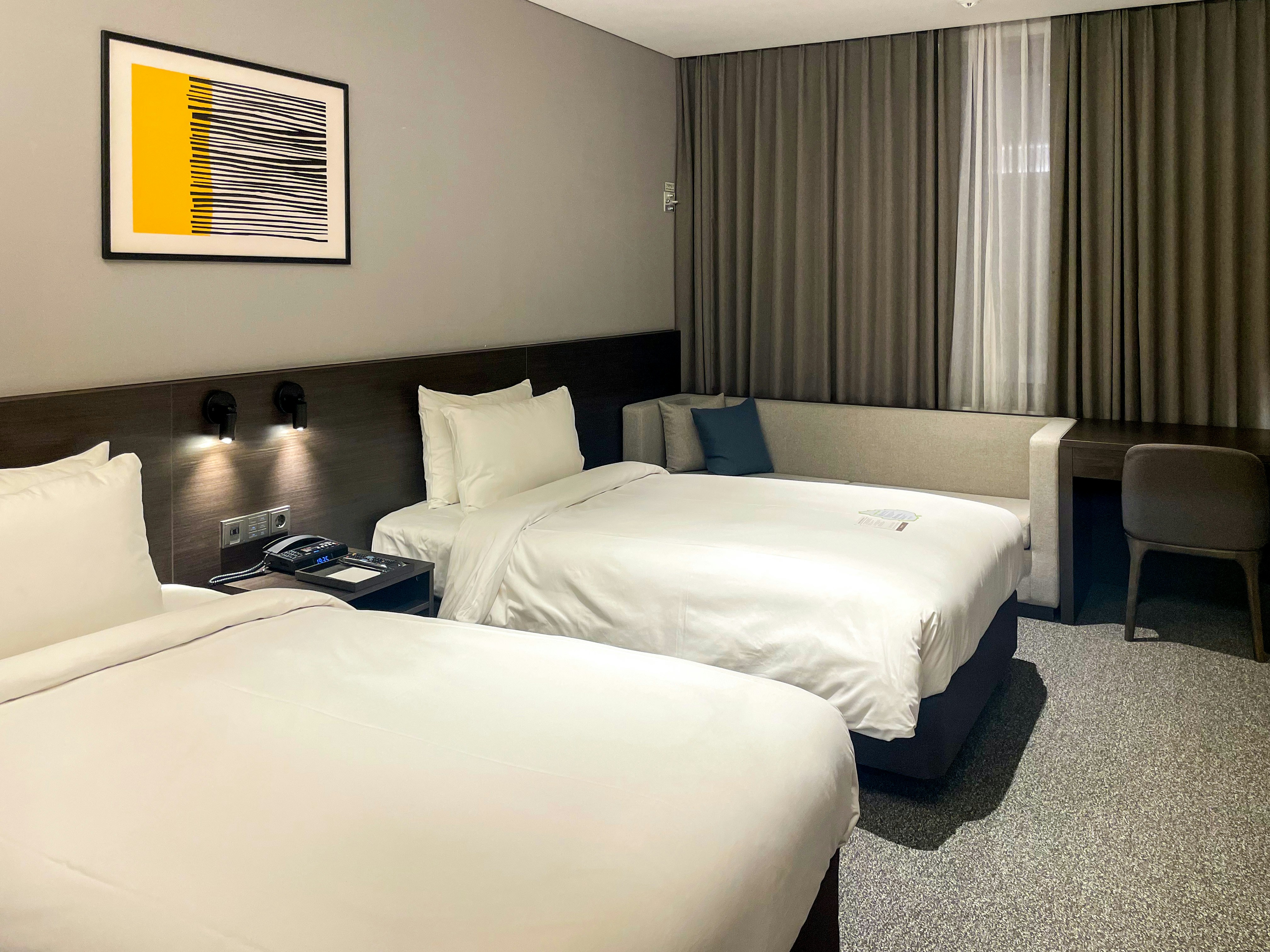 Bright twin room with two single beds and traditional Yorkshire cottage decor